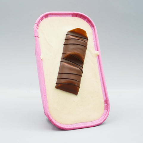 Kinder Bueno Cookie Boat by The Dough Parlour: soft-baked cookie with white chocolate hazelnut ganache and Kinder Bueno pieces in a paper boat