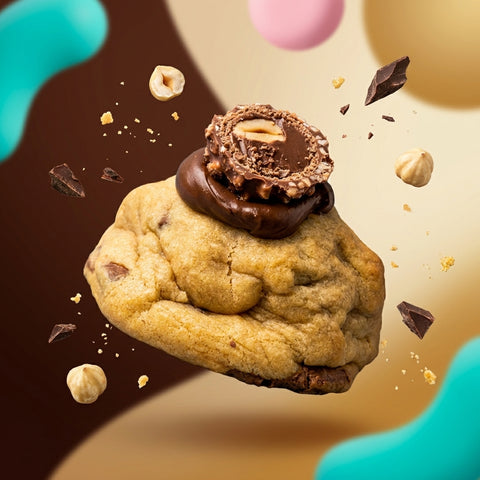 Thick hazelnut-flavored New York style cookie filled with a molten Italian hazelnut cream core and topped with half a Ferrero Rocher.