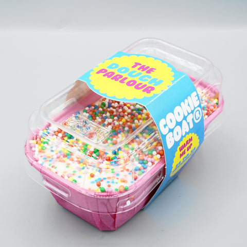 Dot Cookie Boat sealed in its clear-lid gift packaging with The Dough Parlour Cookie Boat sleeve