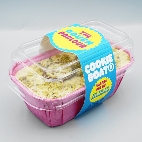 Pistachio Cookie Boat sealed in its clear-lid gift packaging with The Dough Parlour Cookie Boat sleeve