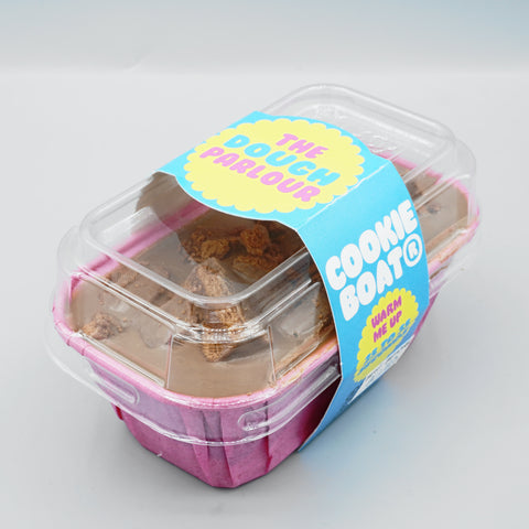 Timmy Teaser Cookie Boat sealed in its clear-lid gift packaging with The Dough Parlour sleeve